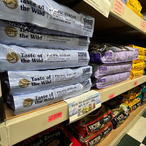 Selection of various bagged pet food inside of Granville Milling